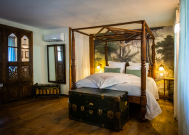 Lit double dans la maison d'hôtes Villa Vanille